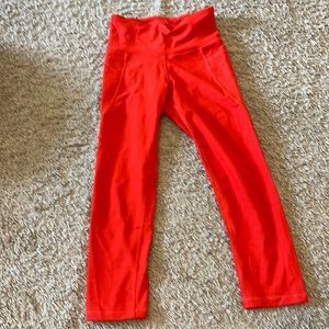 Red cropped leggings